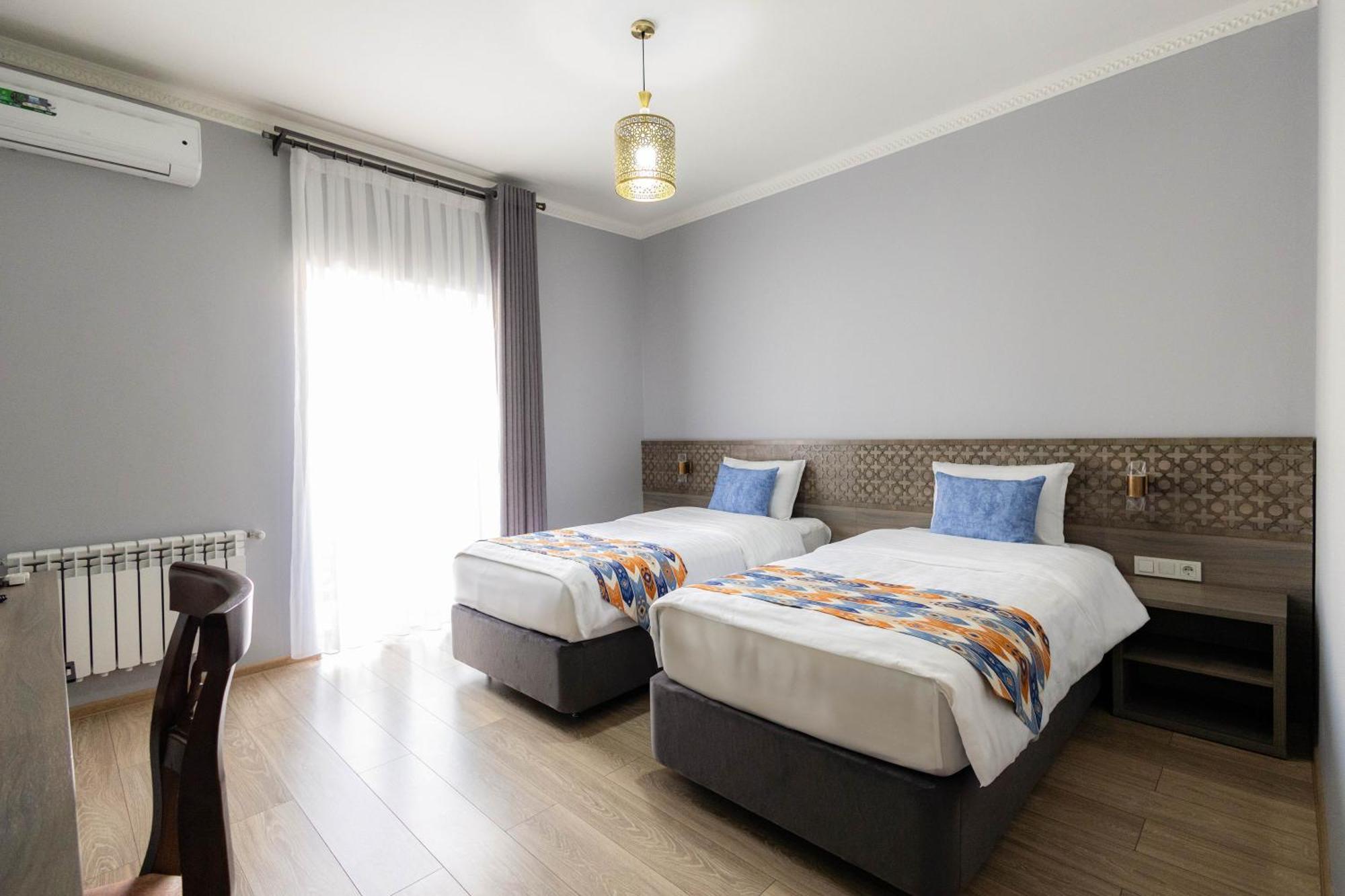 Khan Hotel Samarcande Chambre photo