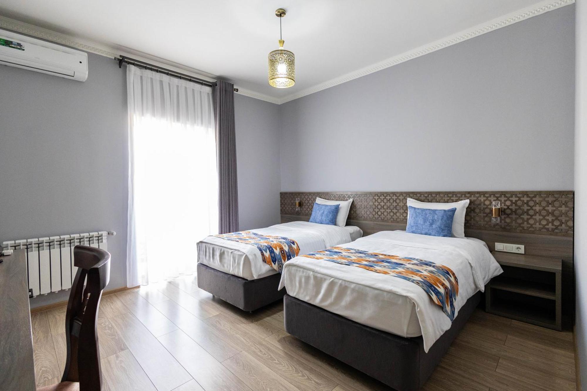 Khan Hotel Samarcande Chambre photo