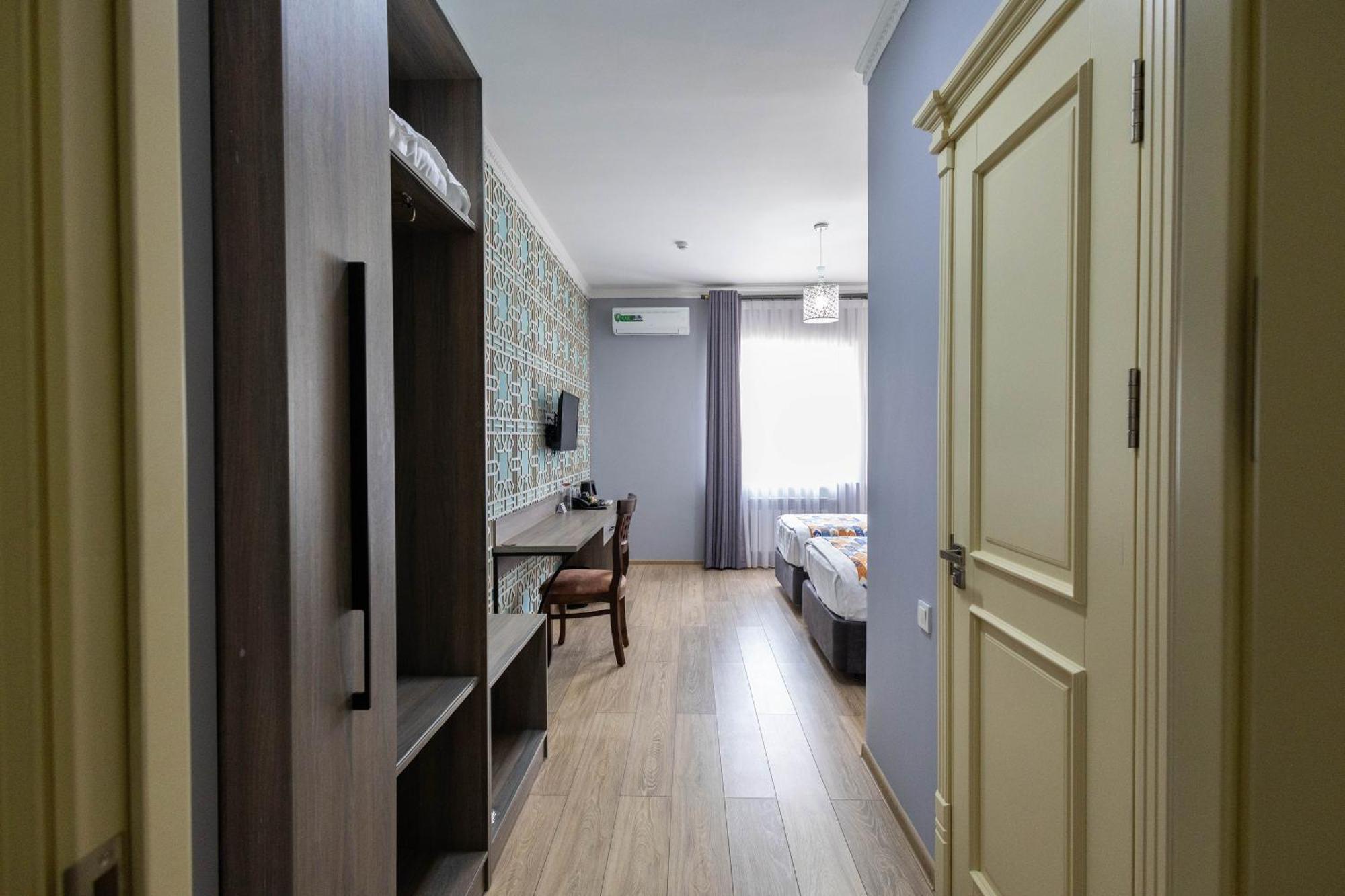 Khan Hotel Samarcande Chambre photo