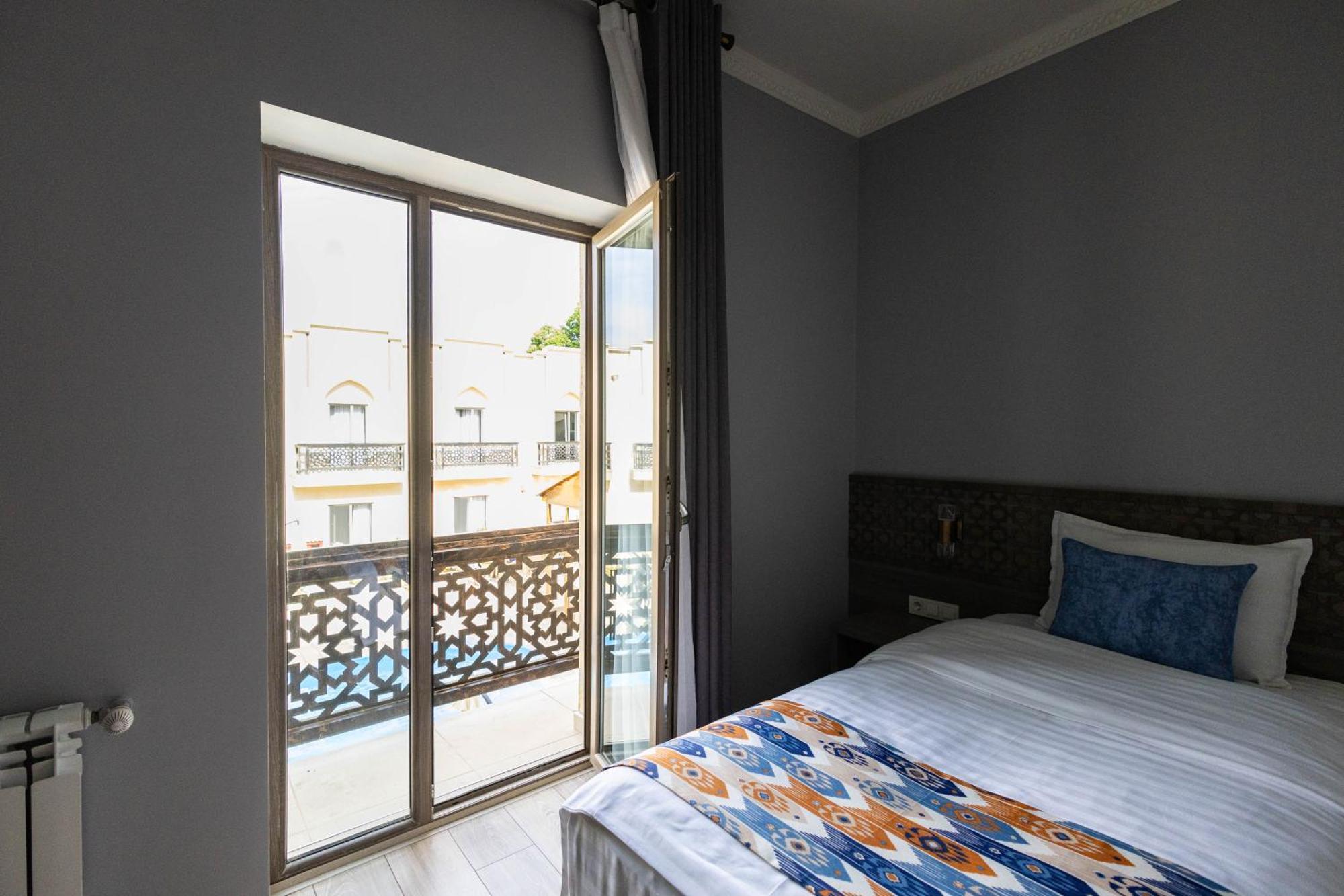 Khan Hotel Samarcande Chambre photo